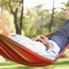 a man sleeping in a hammock