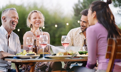 friends eating dinner outside