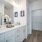 Model bathroom at River Rock at Dallas rental home community in Dallas, NC, featuring white cabinetry.