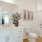 bathroom with a large mirror