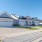 The street-facing house exteriors at River Rock at Dallas rental home community in Dallas, NC, featuring garages.