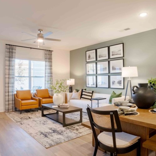 living area that includes ample seating spaces and bright lighting