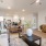 Open living concept showing living room and kitchen combined with ample space for seating and modern living room decor
