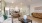 Open living concept showing living room and kitchen combined with ample space for seating and modern living room decor