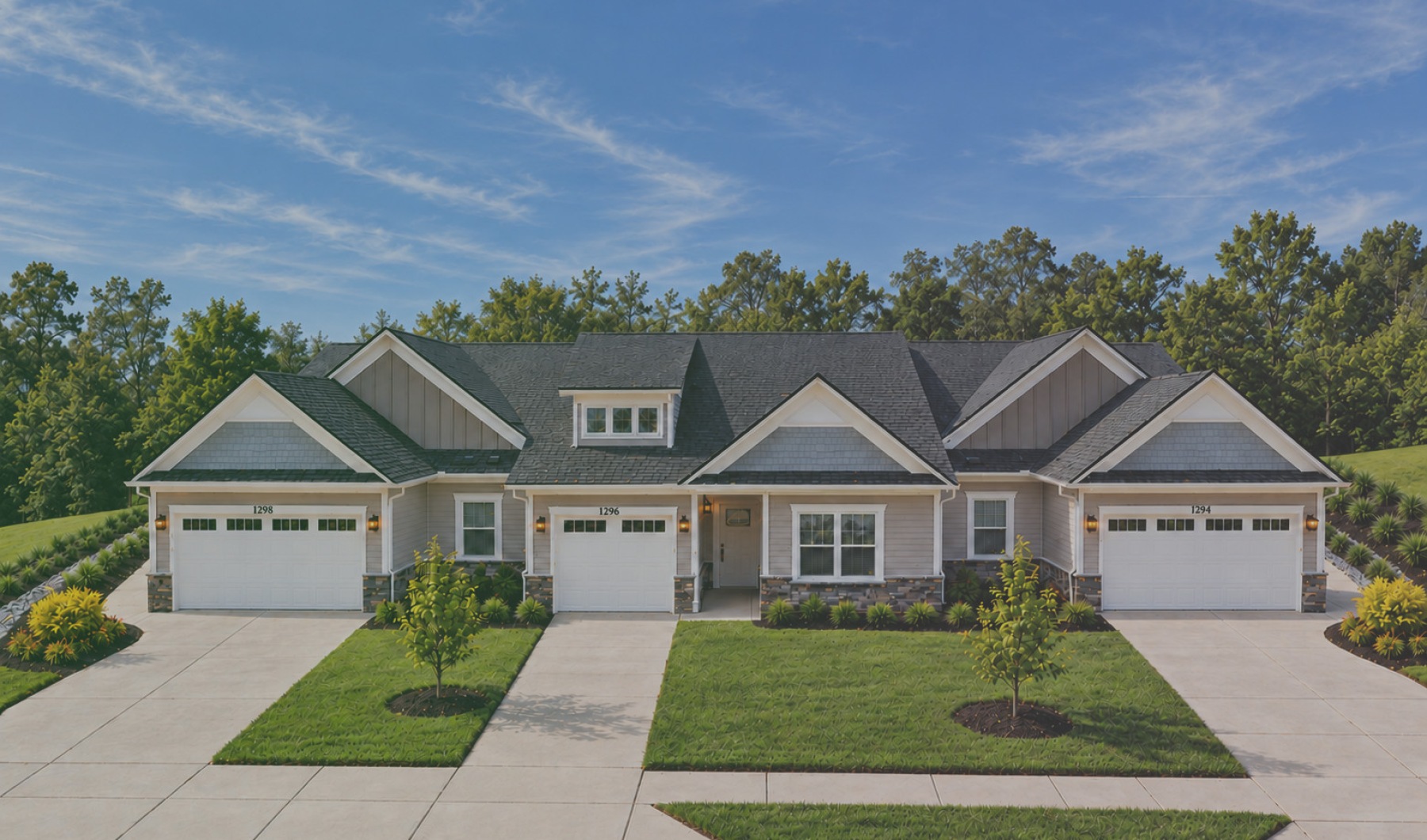 the front of a home with a large window and a garage